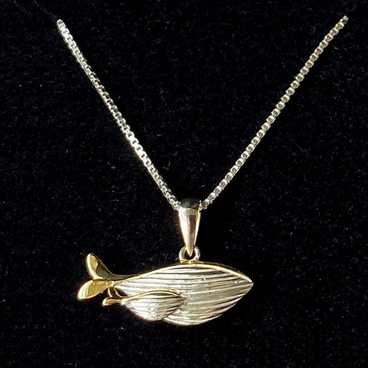 Whale and calf sterling silver pendant with gold accents